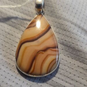 Elegant Teardrop Waved Dolamite Pendant